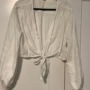 FREE PEOPLE white tie top. Hook and eye closure. Elastic waistband 100% cotton.